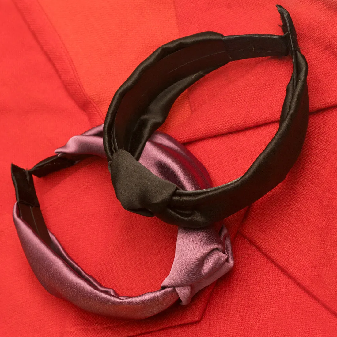 Luxurious Purple Satin Hairband, Adorned With A Stylish Top Knot, Ideal For A Sophisticated Look.